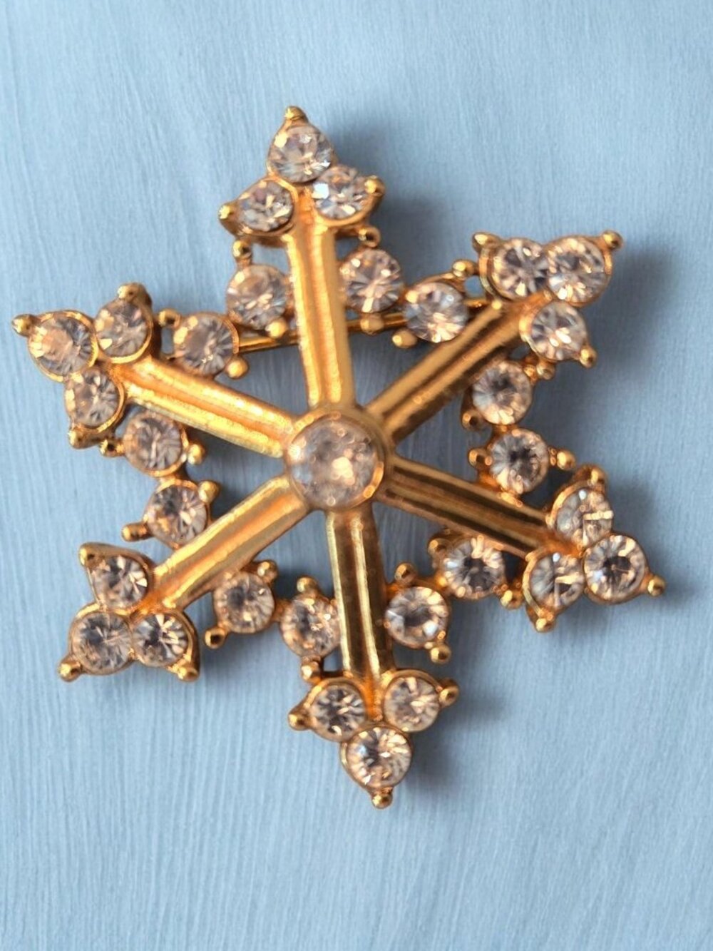 Vintage Snowflake Brooch - gold-tone pin with clear rhinestones